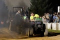 A Young Man Drives at a Lawn Tractor Pull