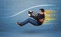 Young man driving in imaginary fast car with blurred lines Royalty Free Stock Photo