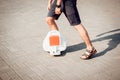 Young man driving on Solowheel in the park.