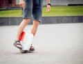 Young man driving on Solowheel in the park.