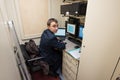 A young man on duty train conductor