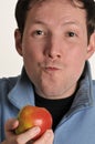 Young man eating apple Royalty Free Stock Photo