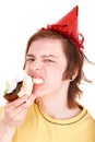 Young man eating chocolate cake. Royalty Free Stock Photo