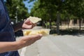 Young man eating a fruit salad outdoors Royalty Free Stock Photo