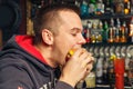 Young man eating a hamburger Royalty Free Stock Photo