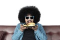 Young man eating hamburger and french fries Royalty Free Stock Photo