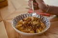 Young man eating pasta for dinner at restaurant. Close up, copy space. Royalty Free Stock Photo