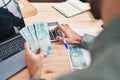 Young man ecommerce business worker holding brazil real banknotes accounting at office