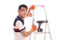 Young man with electric screwdriver and ledder