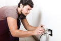 Young man electrician bricolage working Royalty Free Stock Photo