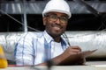 young man electrician wiring inside ceiling Royalty Free Stock Photo