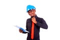 Young man engineer loosens his neck tie Royalty Free Stock Photo