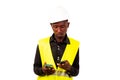 Young man engineer holding two mobile phones Royalty Free Stock Photo