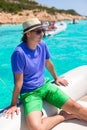 Young man enjoy summer vacation on boat Royalty Free Stock Photo