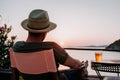 Young man enjoying beer in a beach bar Royalty Free Stock Photo