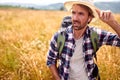 A young man is enjoying walking in the nature. Hiking, nature, activity