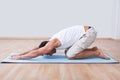 Young Man Exercising On Exercise Mat