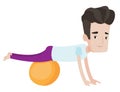 Young man exercising with fitball. Royalty Free Stock Photo