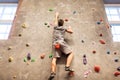 Young man exercising at indoor climbing gym Royalty Free Stock Photo