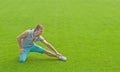 Young man exercising on sports field Royalty Free Stock Photo