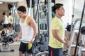 Young man exercising triceps pushdown at the rope cable machine Royalty Free Stock Photo