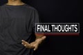 Young man with Final Thoughts text isolated on black background