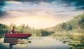 young man fishing in lake Royalty Free Stock Photo