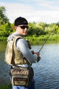 A young man fishing Royalty Free Stock Photo