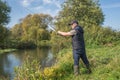 Young man fishing on the river. Outdoor recreation Royalty Free Stock Photo