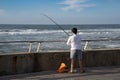 A Young Man Fishing at the Tel Aviv Port Royalty Free Stock Photo