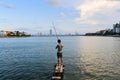 Young man fishing on west lake Royalty Free Stock Photo