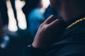 Young man fixes his collar. Royalty Free Stock Photo