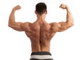 Young man flexing his arm and back muscles Royalty Free Stock Photo