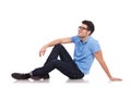Young man on the floor looking away Royalty Free Stock Photo