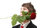 Young man, flower, red rose isolated Royalty Free Stock Photo