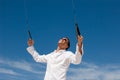 Young Man Flying a Stunt Kite