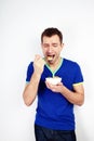 Young man forced to eat yogurt