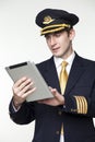 Young man in the form of a passenger plane pilot Royalty Free Stock Photo