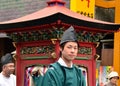 Young man in formal Shinto priest attire