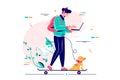 Young man freelancer with dog using laptop run on skateboard. Royalty Free Stock Photo