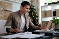 Young man freelancer working with computer laptop at home Royalty Free Stock Photo