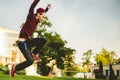 Young man freerun in summer city public park running, jumping and flying, parkour concept Royalty Free Stock Photo