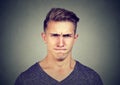 Young man full of hatred looking off and annoyed Royalty Free Stock Photo