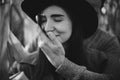 Young man gently hugging his fashionable woman in autumn corn field, black and white photo Royalty Free Stock Photo