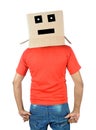 Young man gesturing with a cardboard box on his head with sad fa Royalty Free Stock Photo