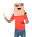 Young man gesturing with a cardboard box on his head with smiley Royalty Free Stock Photo