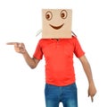 Young man gesturing with a cardboard box on his head with smiley Royalty Free Stock Photo