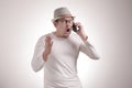 Young Man Getting Bad News on Phone, Shocked and Angry Royalty Free Stock Photo