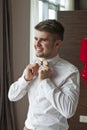 Young man getting ready for a special day. Royalty Free Stock Photo