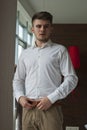 Young man getting ready for a special day. Royalty Free Stock Photo